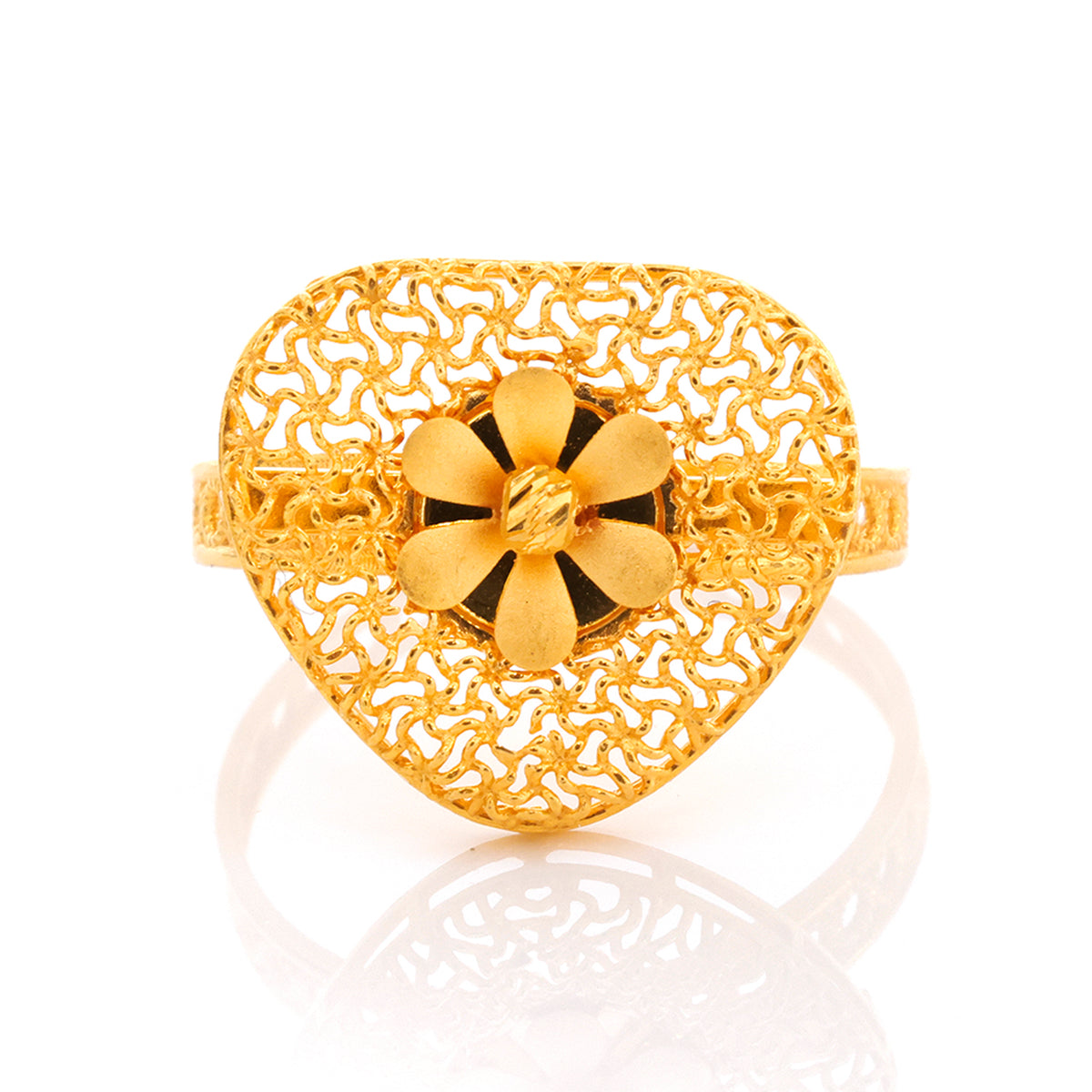 Gold ring with floral design on a white background