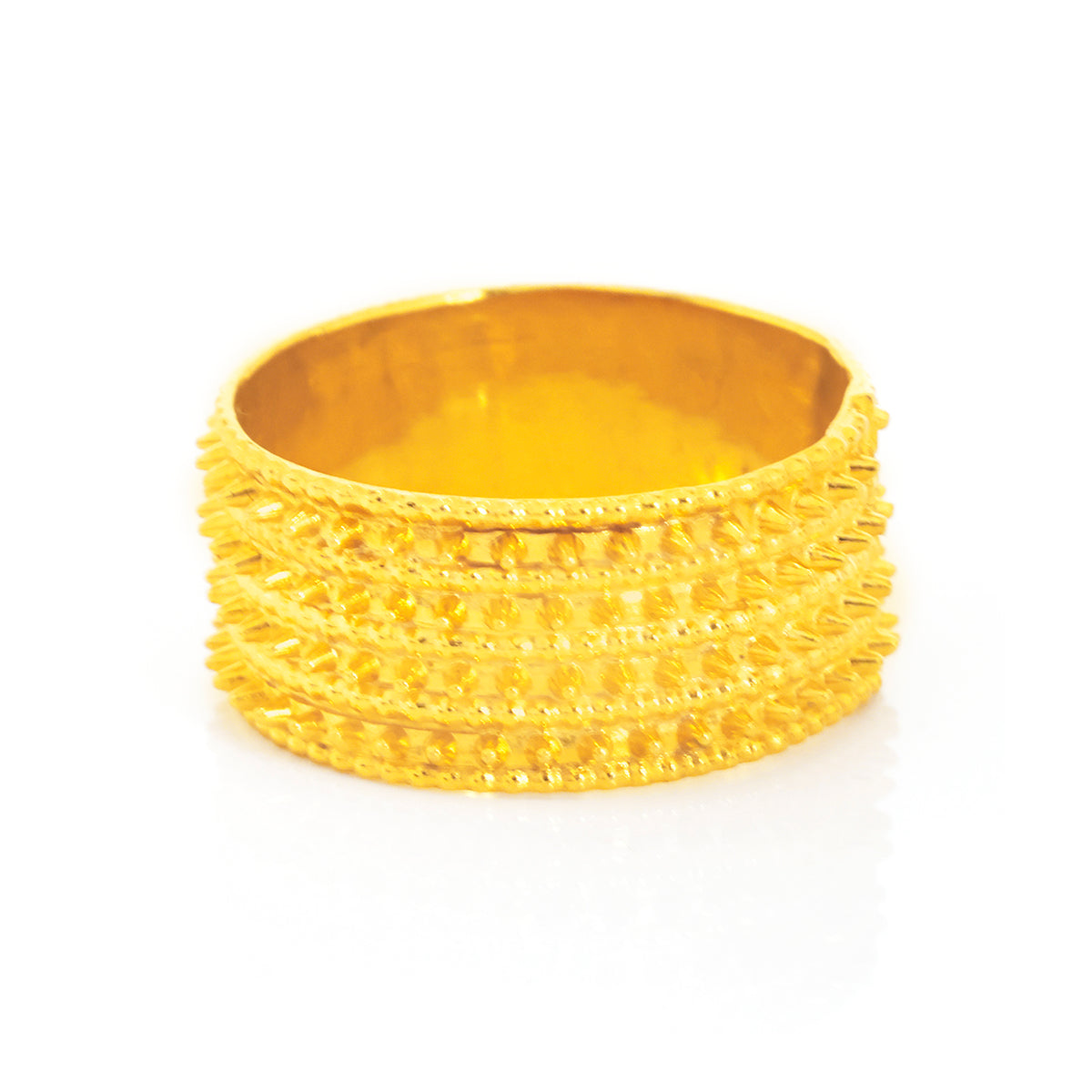 Gold bracelet on a white background