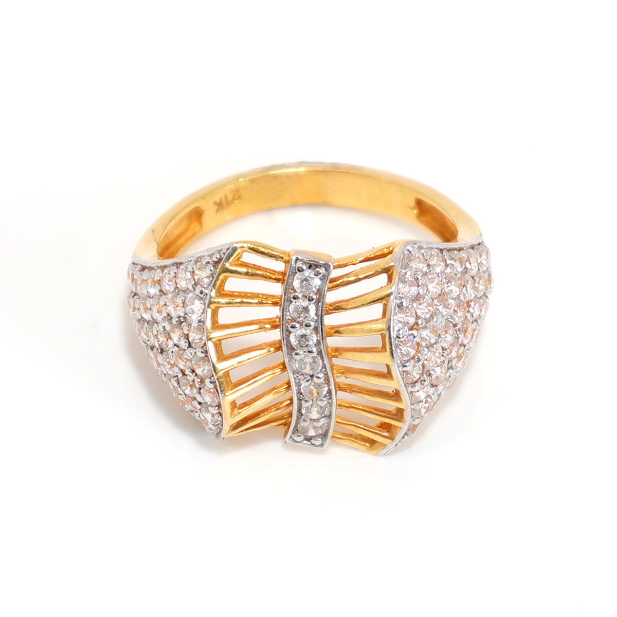 Gold and silver ring with diamond accents on a white background