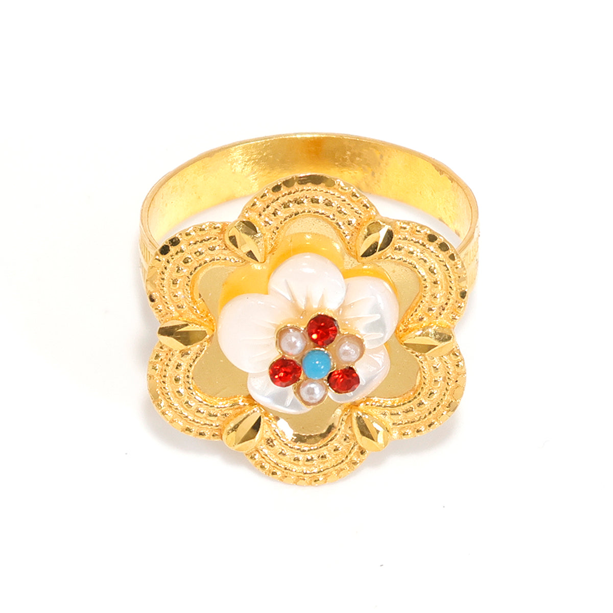Gold ring with a floral design featuring pearls and red stones on a white background