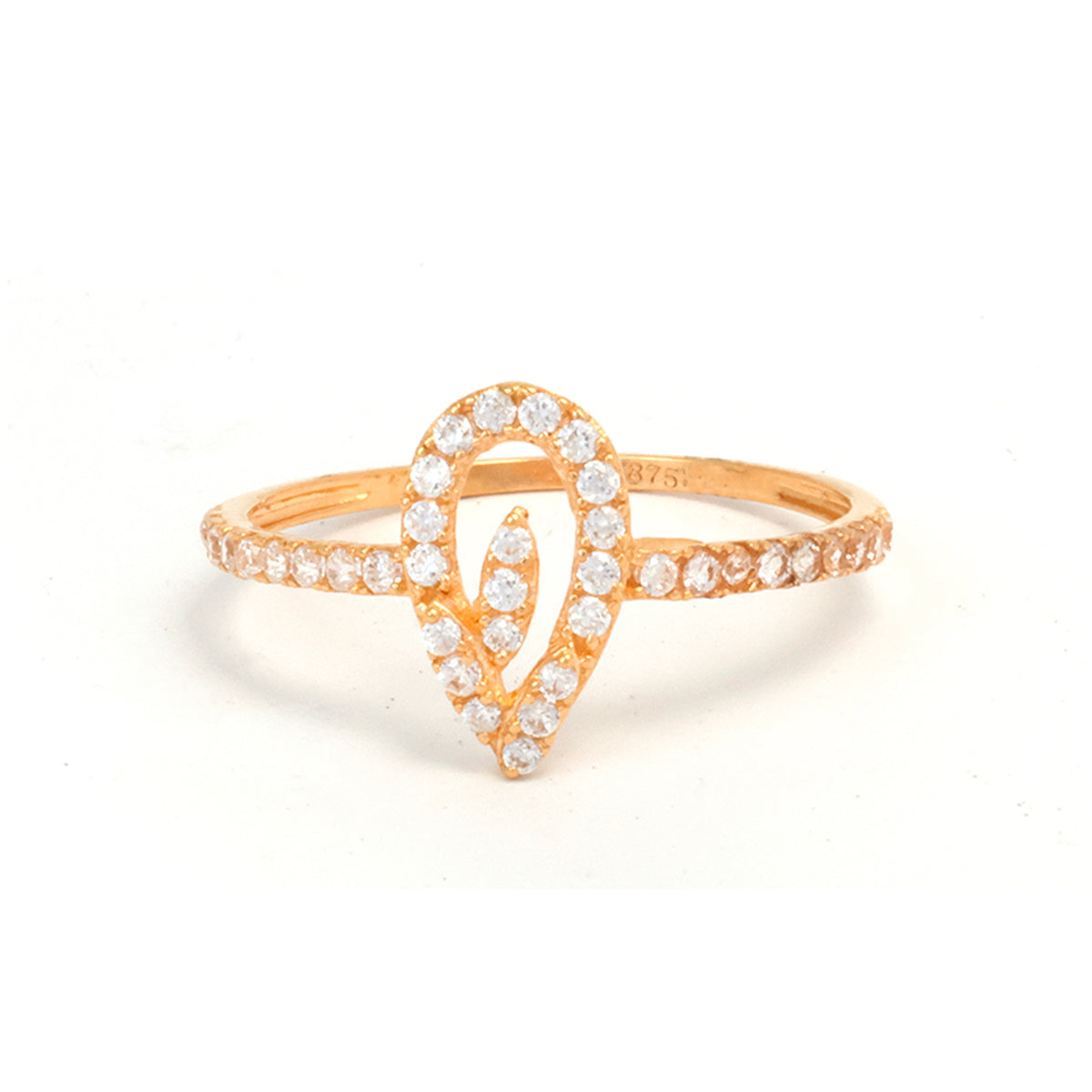 Gold ring with diamond accents on a white background