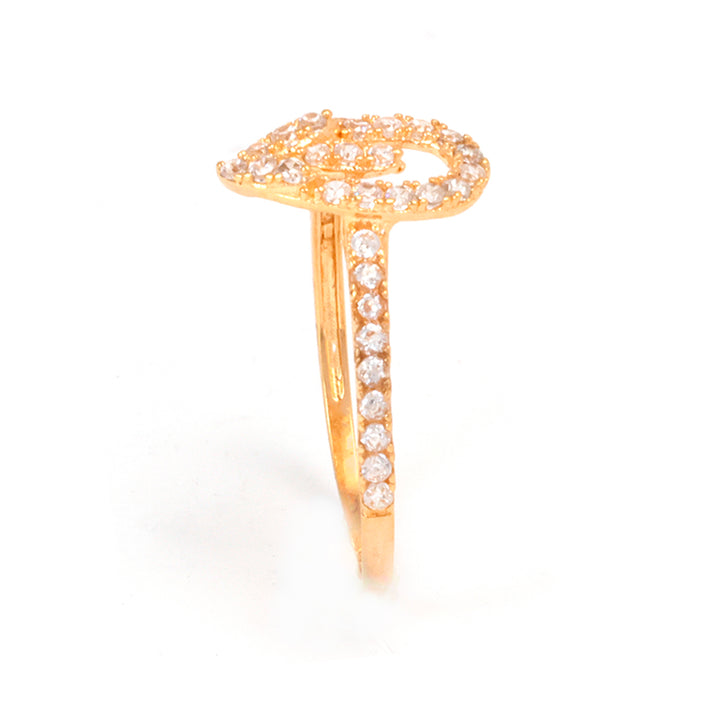Gold ring with diamond accents on a white background