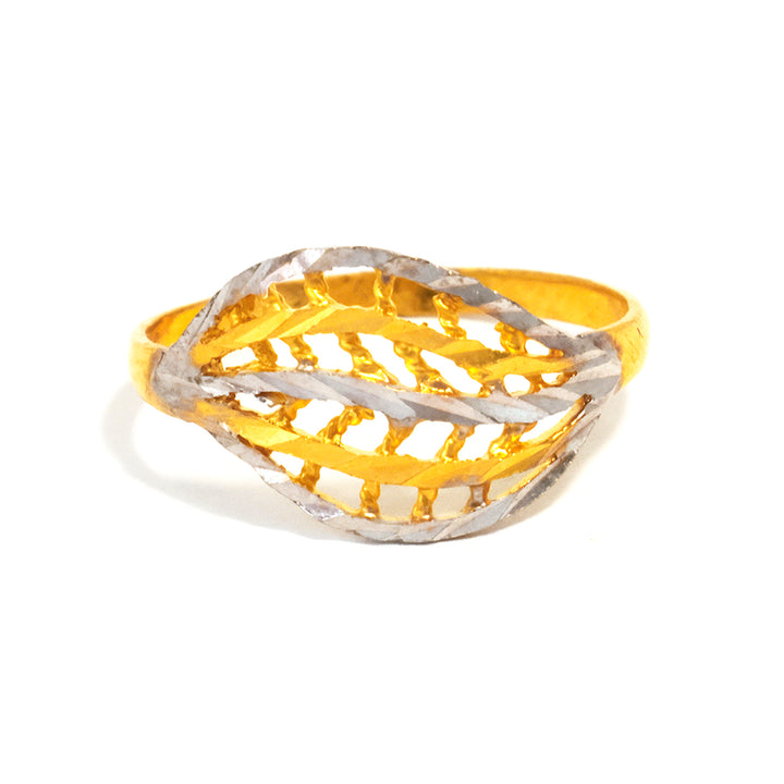 Gold and silver ring with a braided design on a white background