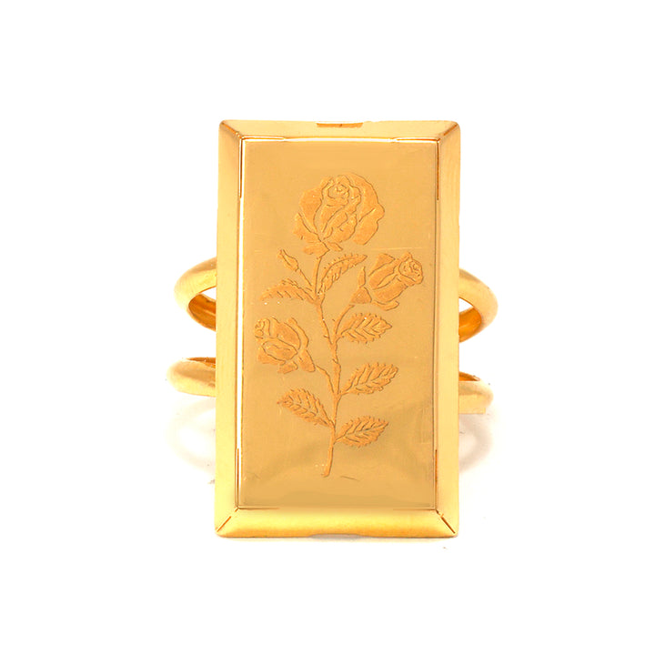 Gold ring with engraved rose design on a white background