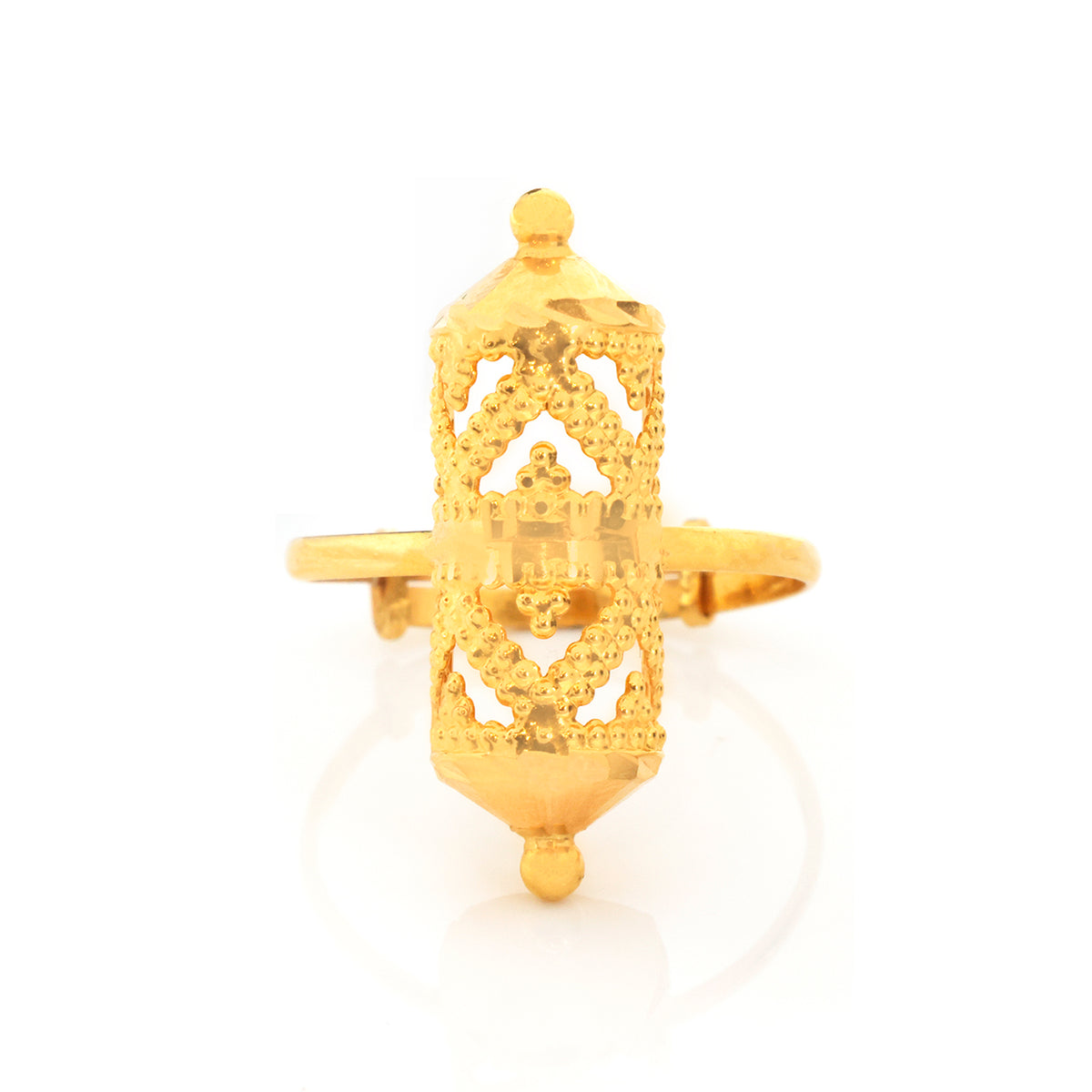 A gold ring featuring a detailed, ornate lantern-shaped pendant with intricate cutout patterns, displayed on a clean white background with a soft reflection.