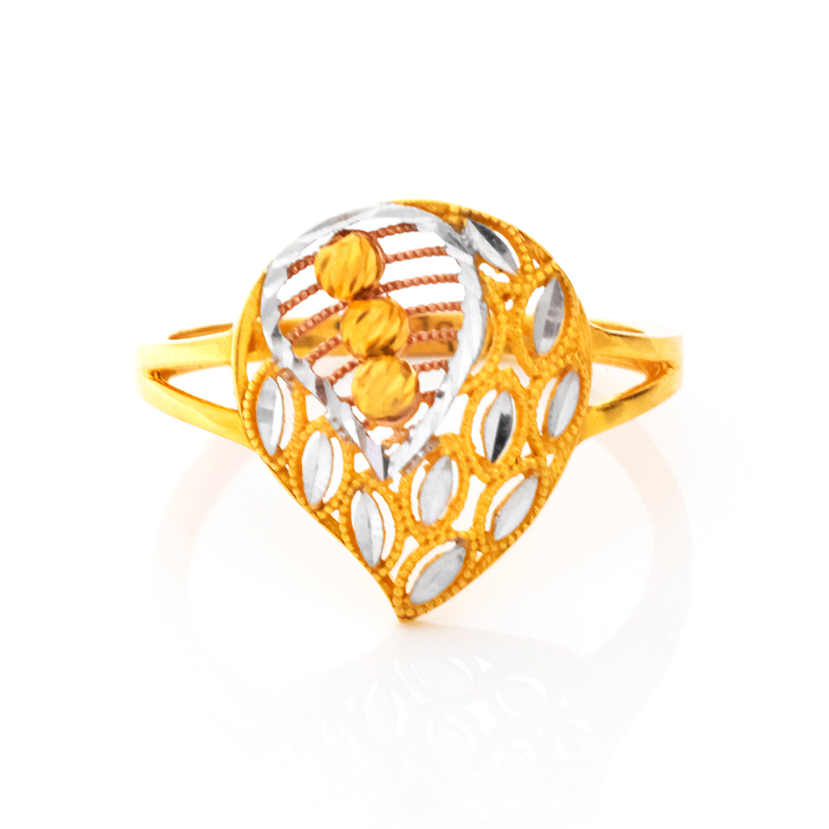 Gold and silver ring with intricate design on a white background