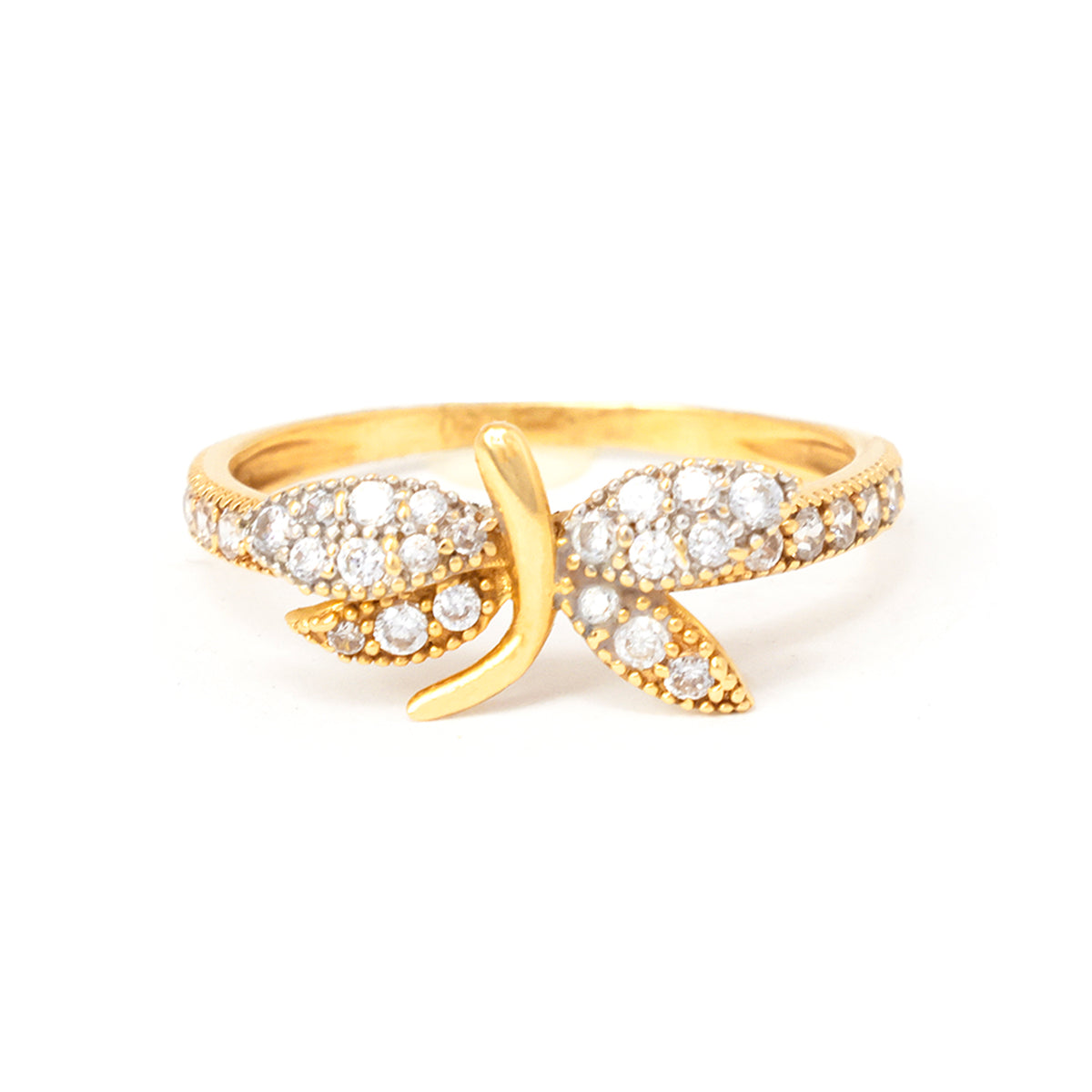 Gold ring with diamond accents on a white background