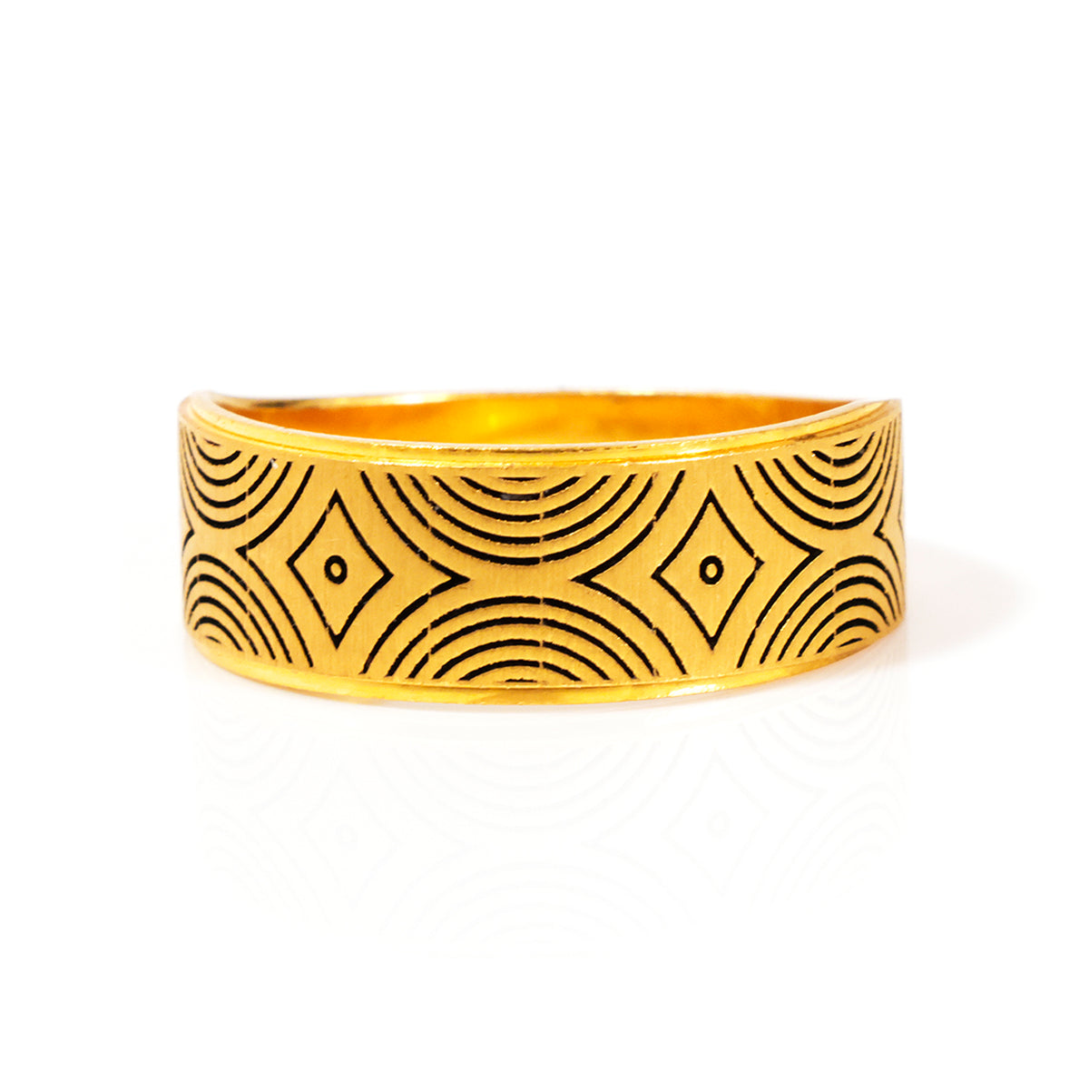 Gold bracelet with black geometric pattern on a white background