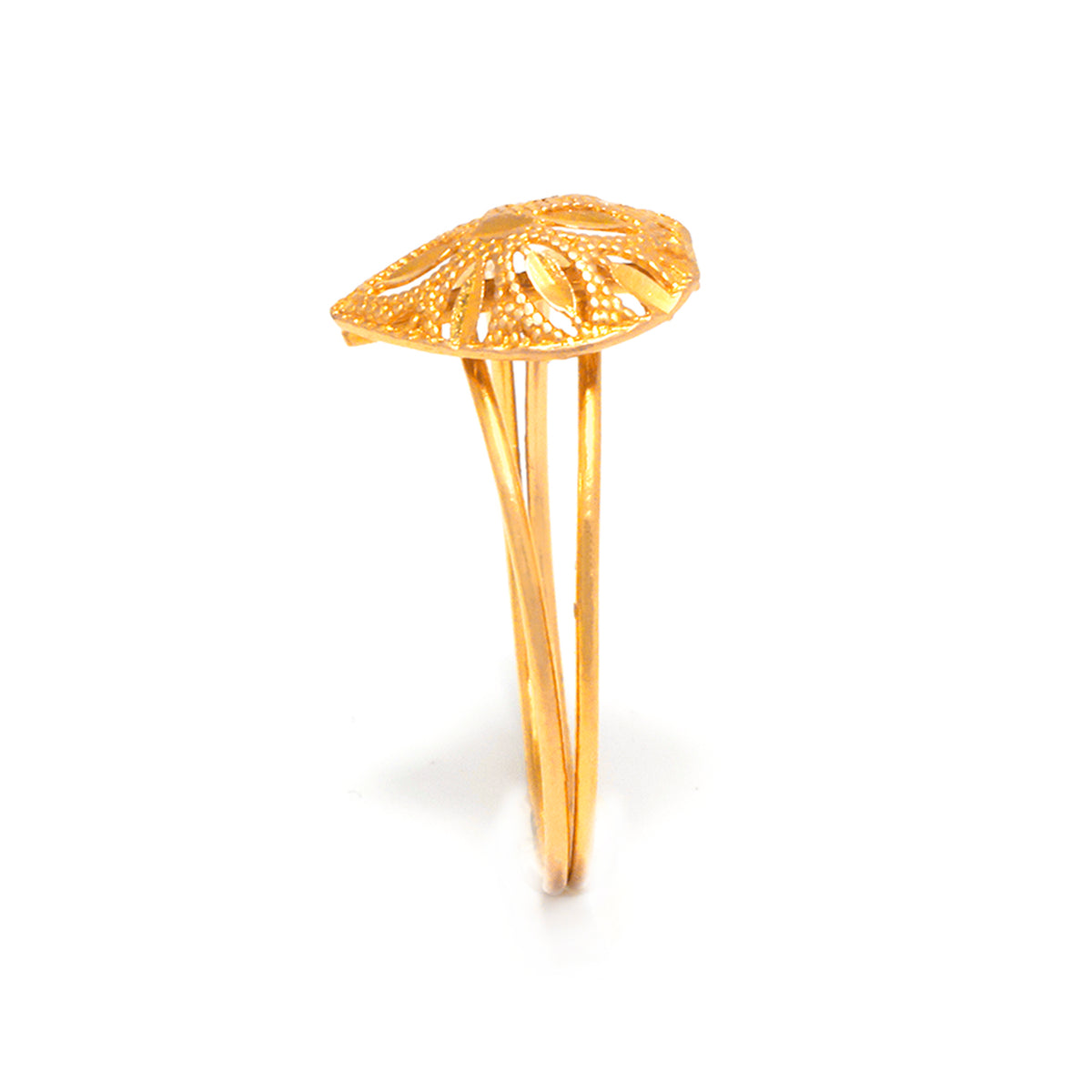 Gold ring with a floral design on a white background
