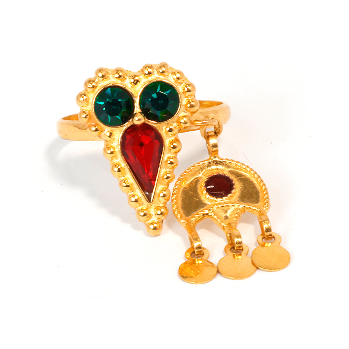 Gold ring with green and red gemstones on a white background