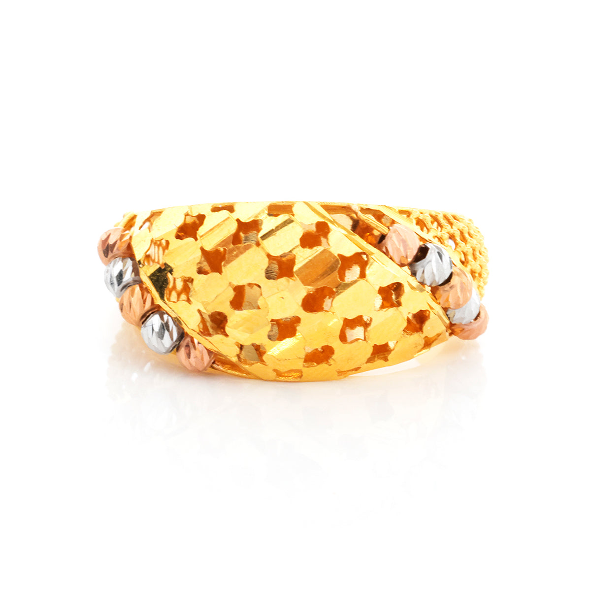 Gold ring with textured design and silver beads on a white background