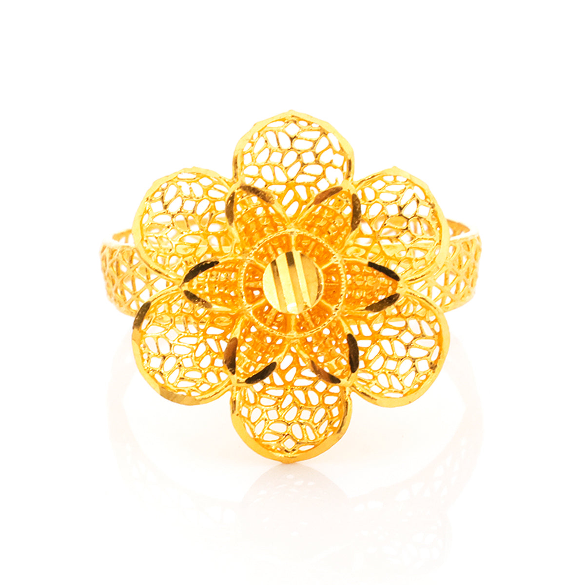 Gold floral ring on a white background