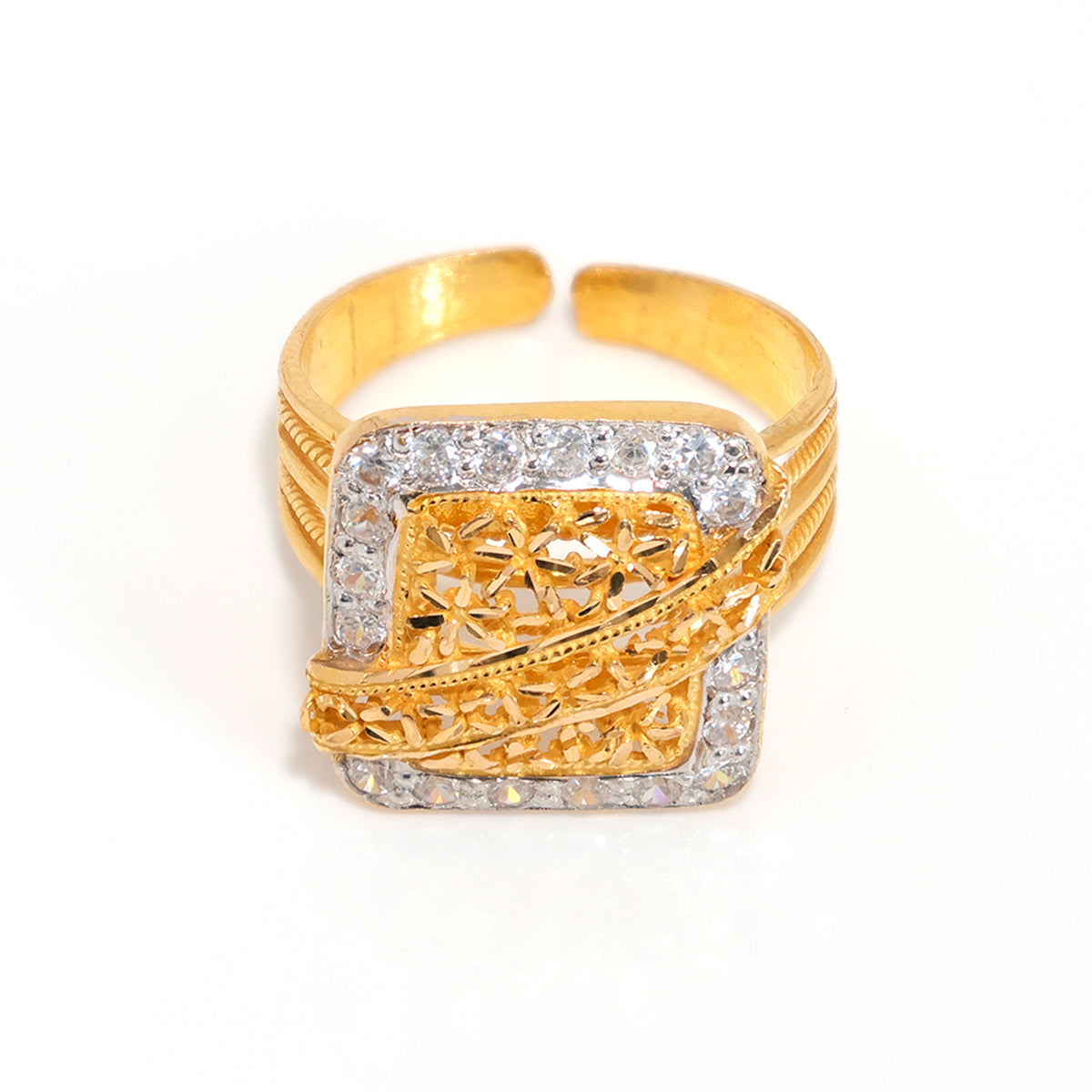 Gold ring with diamond accents on a white background