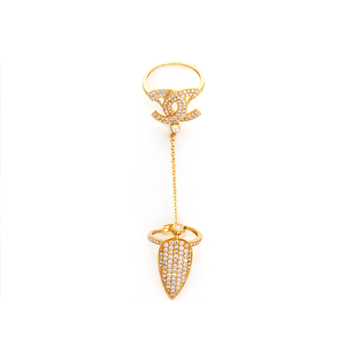Gold ring with a dangling diamond-encrusted arrowhead on a white background