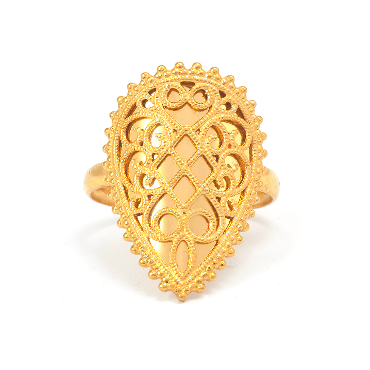 Gold filigree ring on a white background