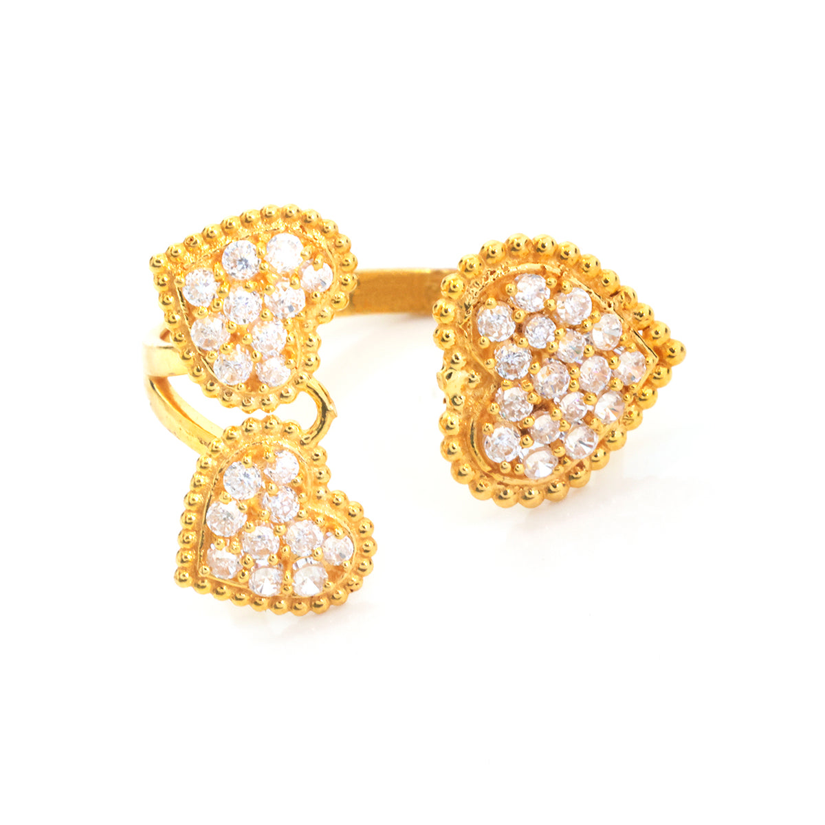 A gold heart-shaped ring featuring pavé-set clear stones, shown on a plain white background.