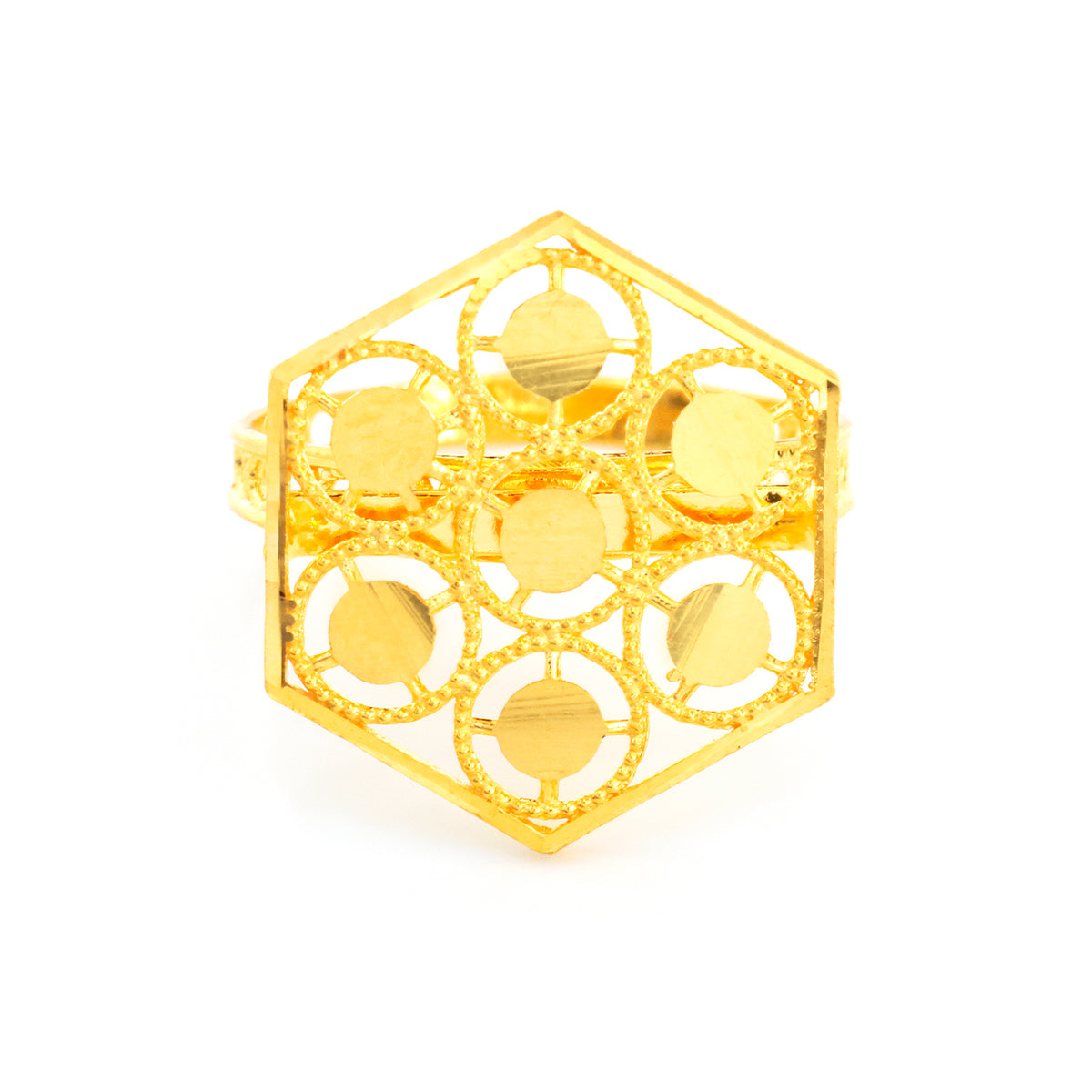 A gold ring with a hexagonal filigree design featuring circular cutouts and raised geometric details, shown on a plain white background.