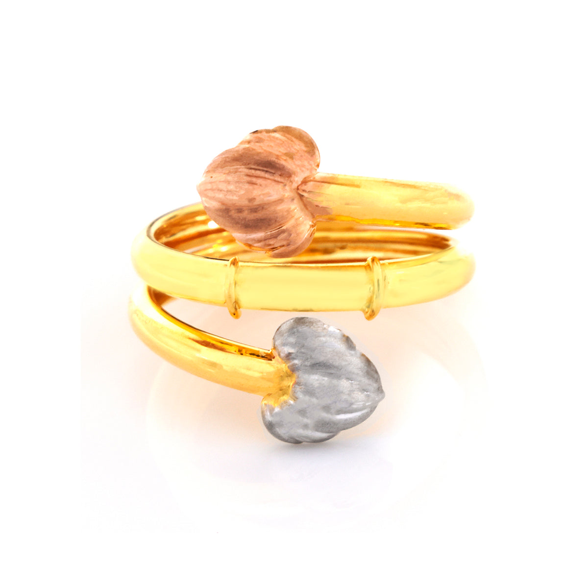A gold-plated double ring set featuring one textured rose gold heart and one textured silver heart, displayed on a clean white background.