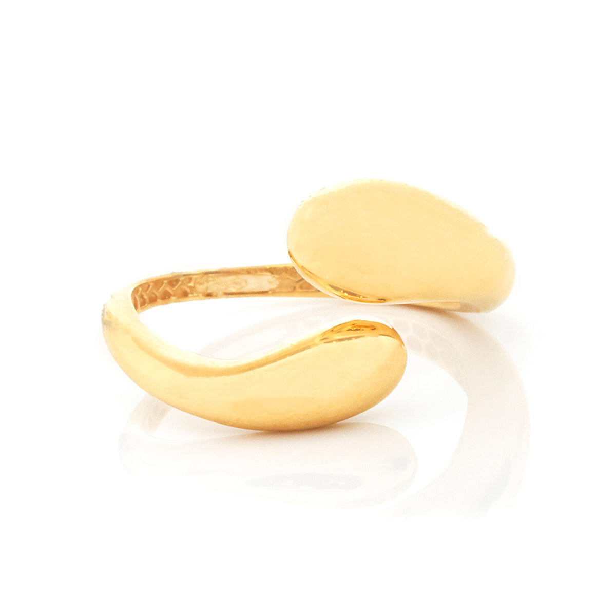 A gold-toned open ring band with two smooth, rounded ends, photographed on a clean white background with a soft reflection below.