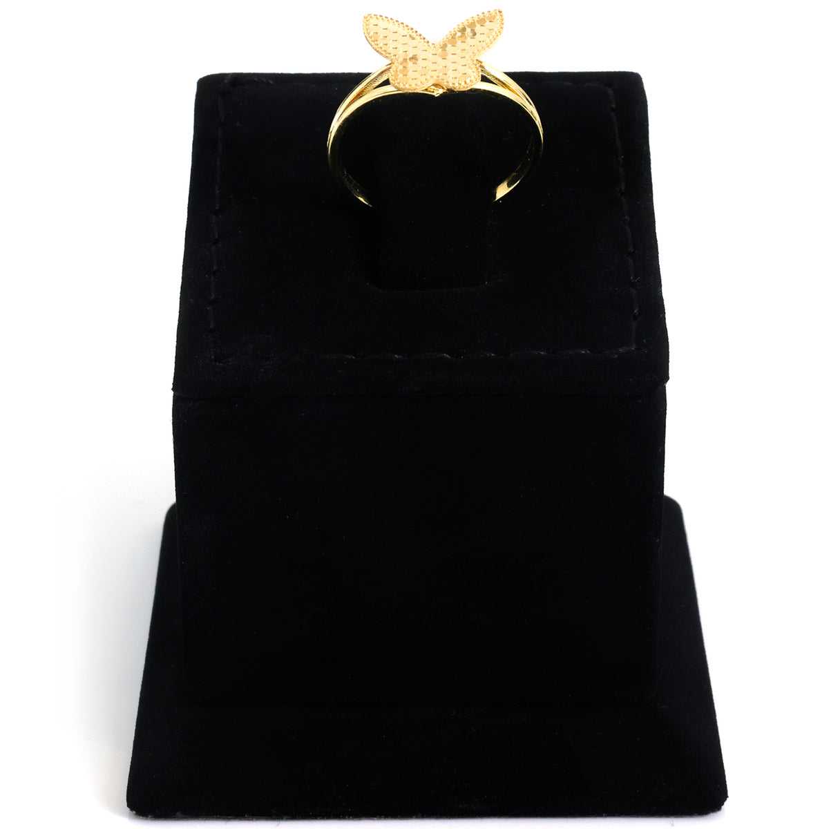 A gold butterfly ring displayed on a black velvet ring box against a white background.