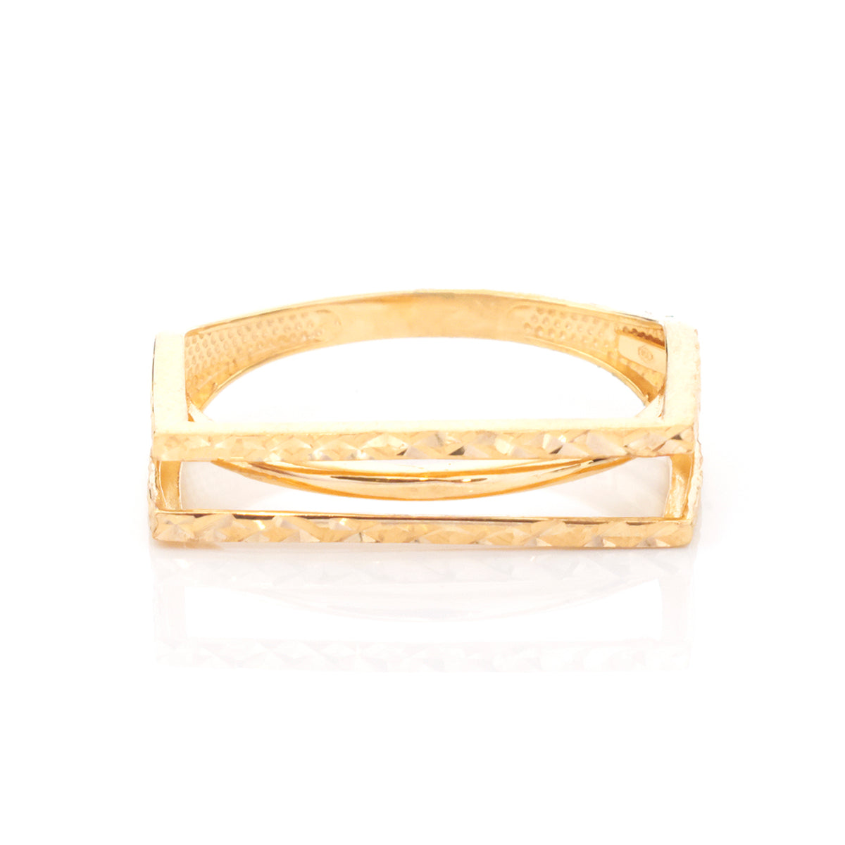 A gold ring with a textured, hammered finish and a rectangular openwork design, shown on a clean white background with a soft reflection.