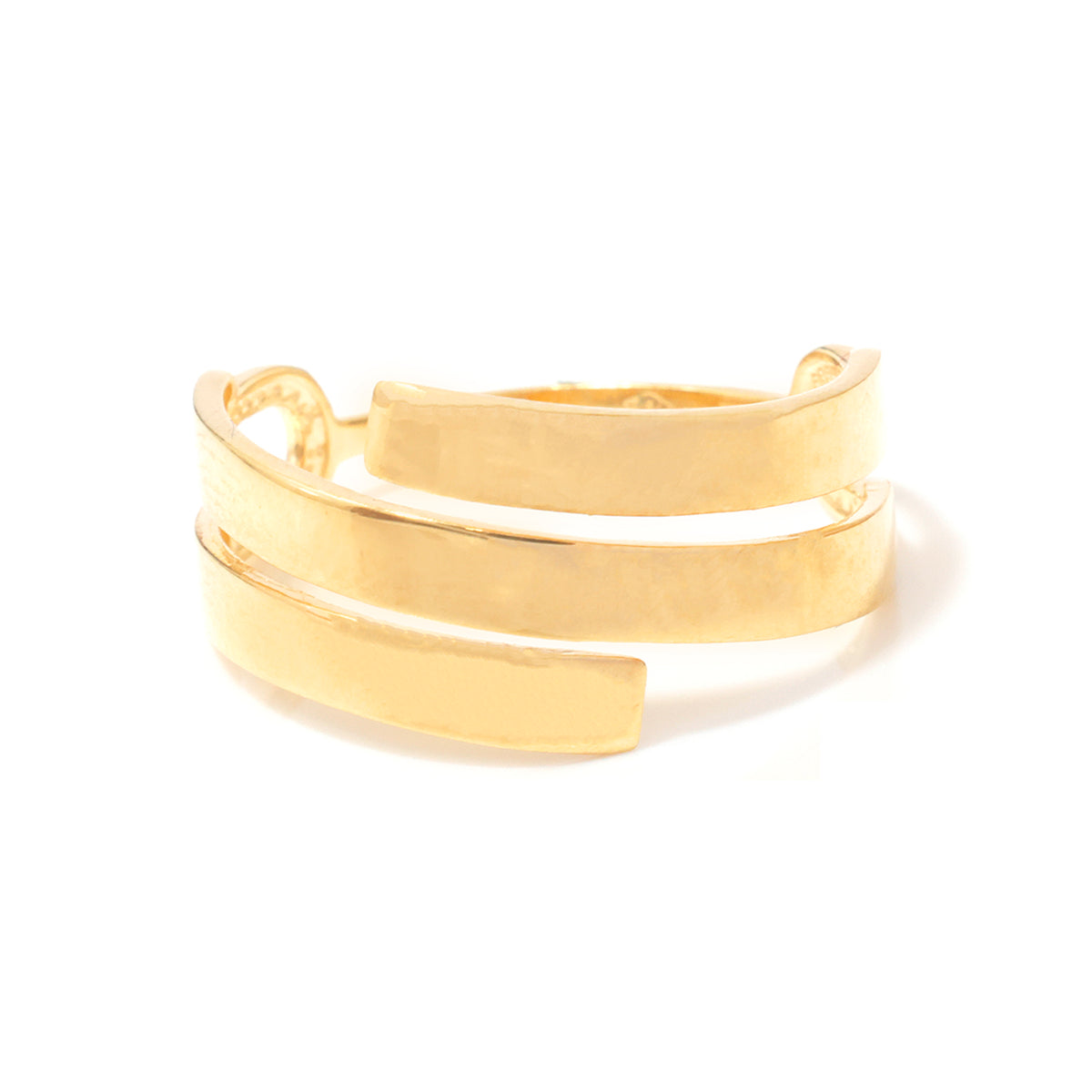 A gold-plated wrap cuff bracelet with a textured, hammered finish, displayed on a clean white background.