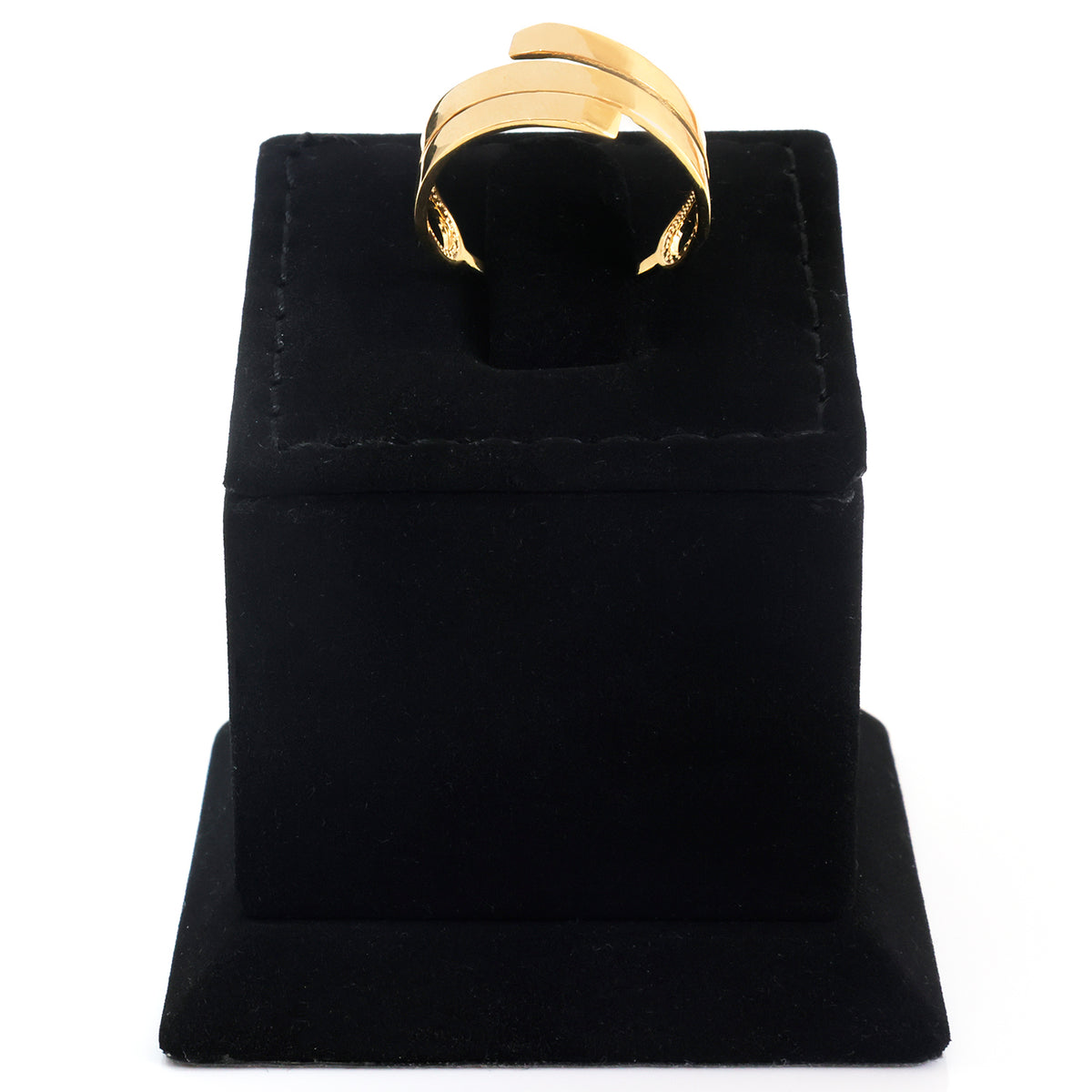 A gold ring displayed on a black velvet ring stand against a plain white background.