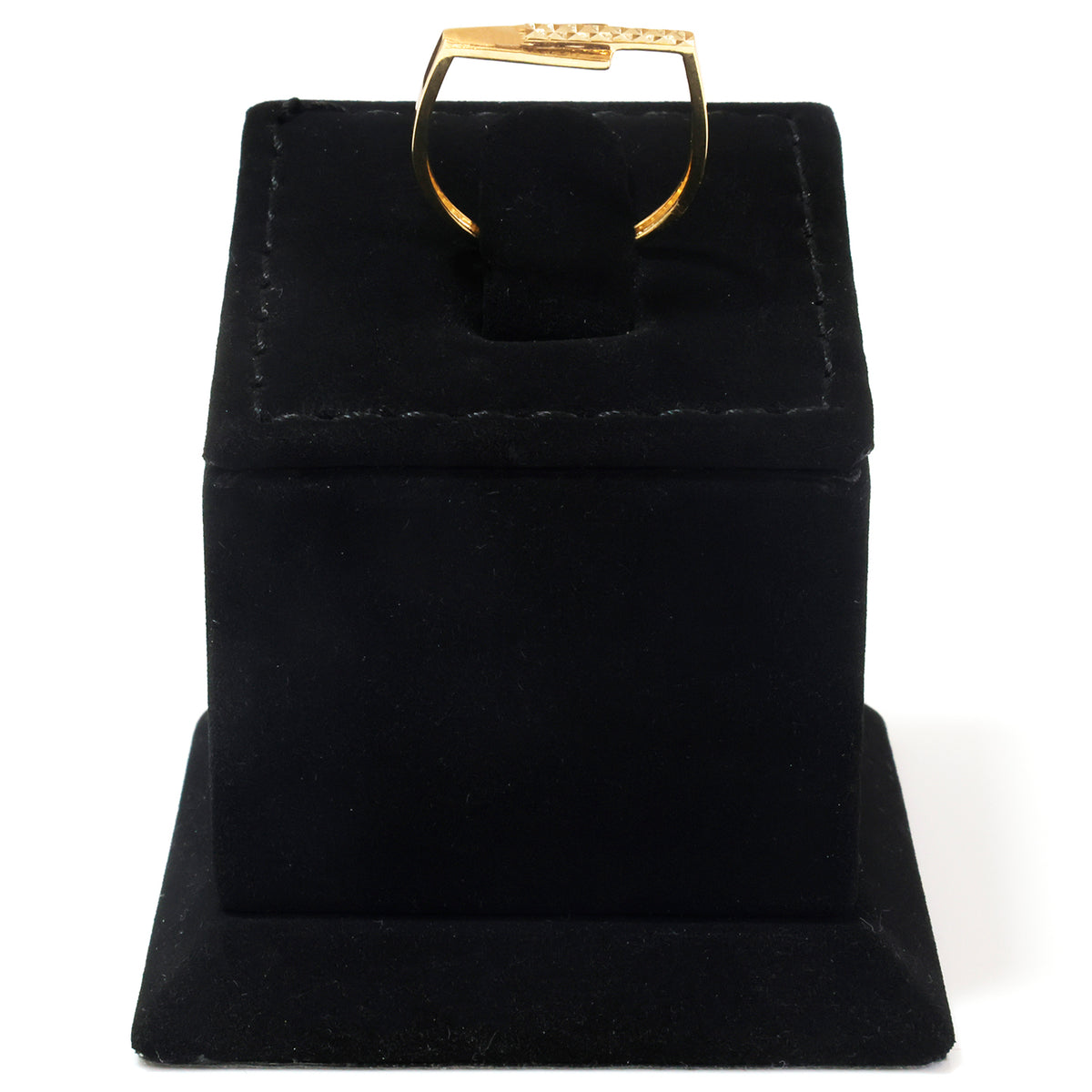 A gold ring displayed on a black velvet jewelry box stand against a white background.
