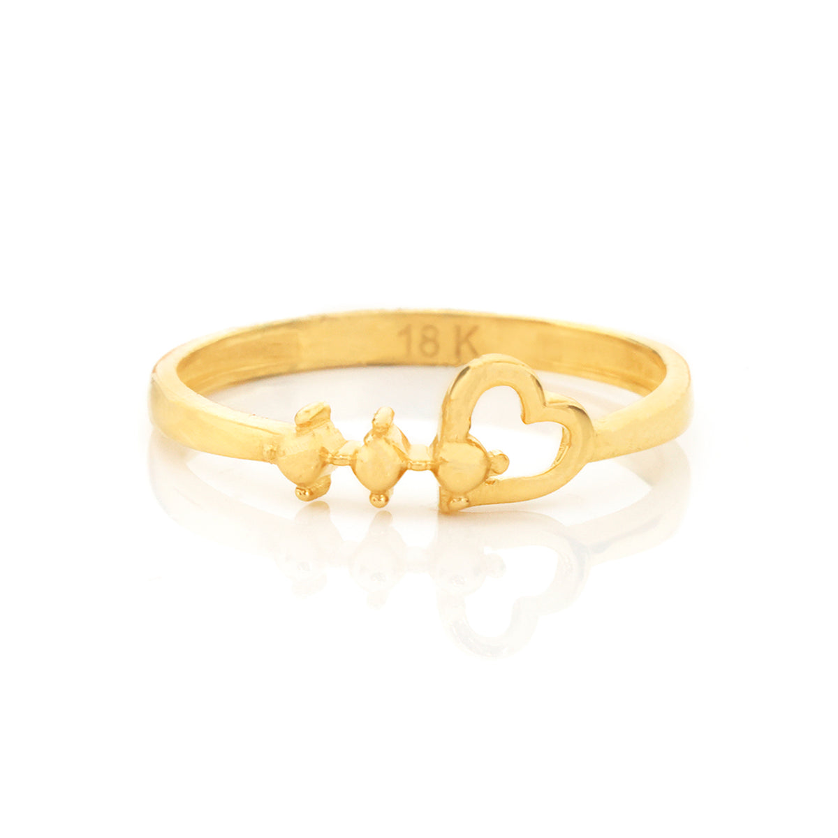 A gold ring featuring a heart and bunny motif, with '18K' stamped inside the band, shown on a clean white background with a soft reflection.
