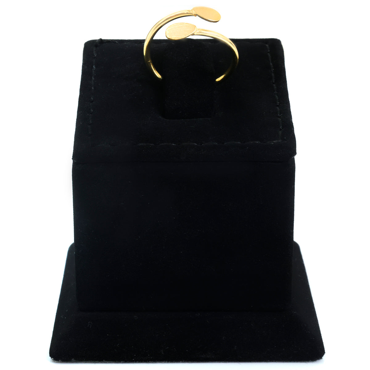 A gold open-band ring displayed on a black velvet jewelry stand against a plain white background.