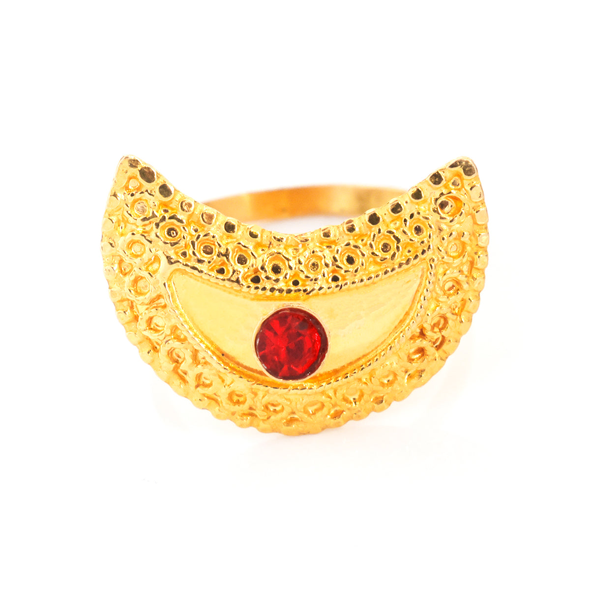 A gold crescent moon ring with intricate filigree detailing and a central round red gemstone, shown on a plain white background.