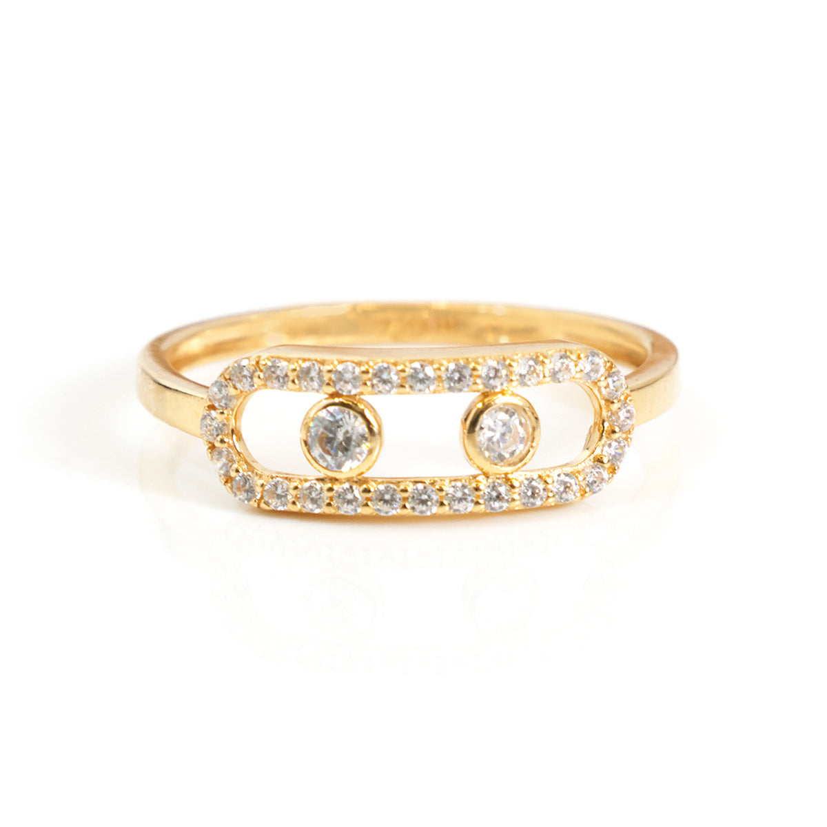 A gold ring featuring an open rectangular frame paved with small clear stones, with two round clear center stones, shown on a white background.