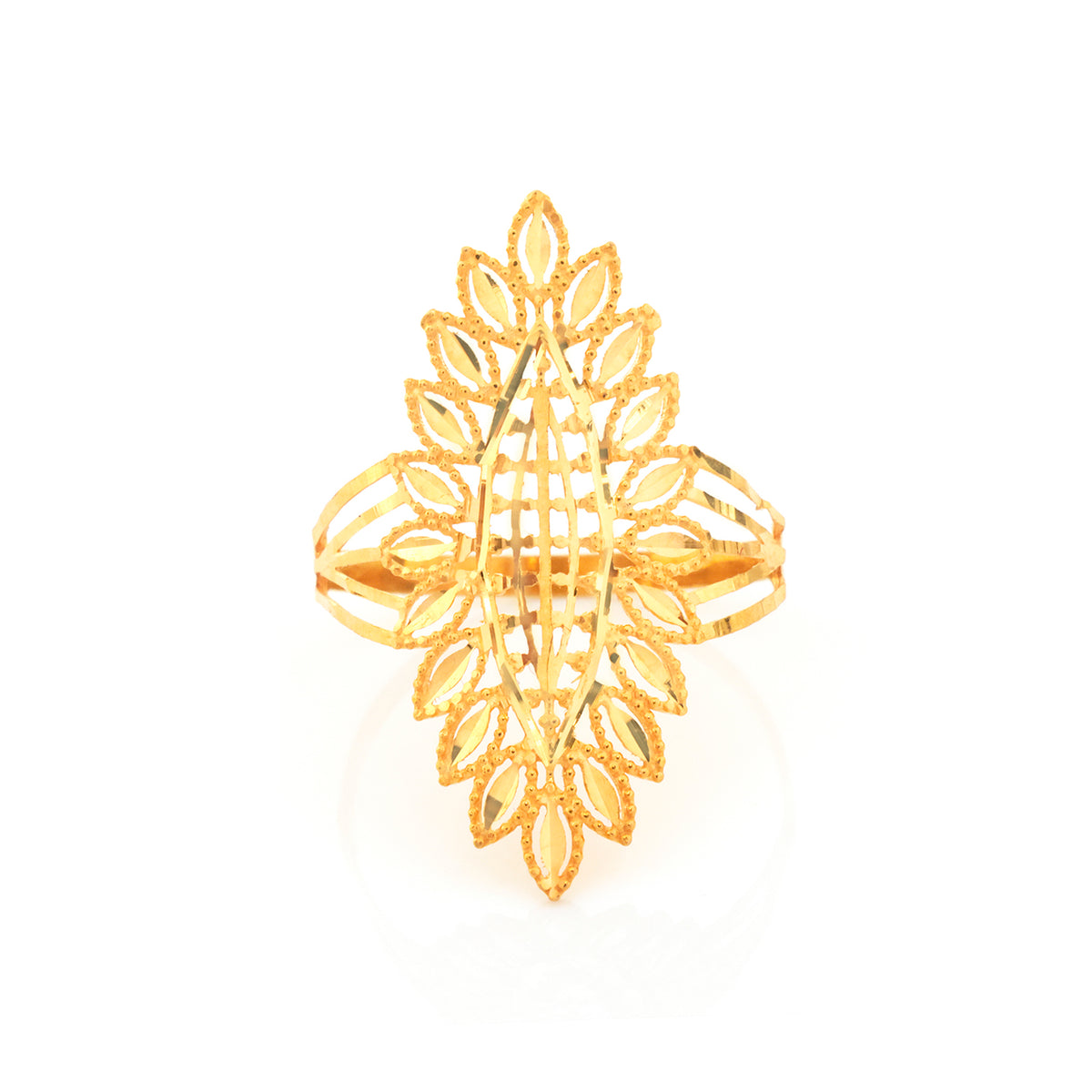A gold filigree ring with a leaf-like symmetrical design, photographed on a clean white background.