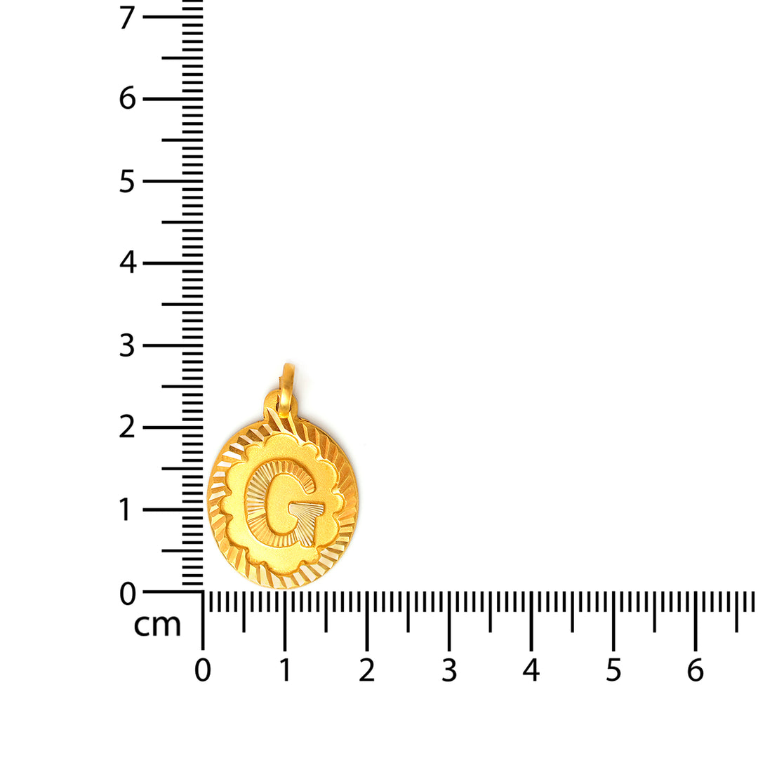 Gold pendant with a letter &