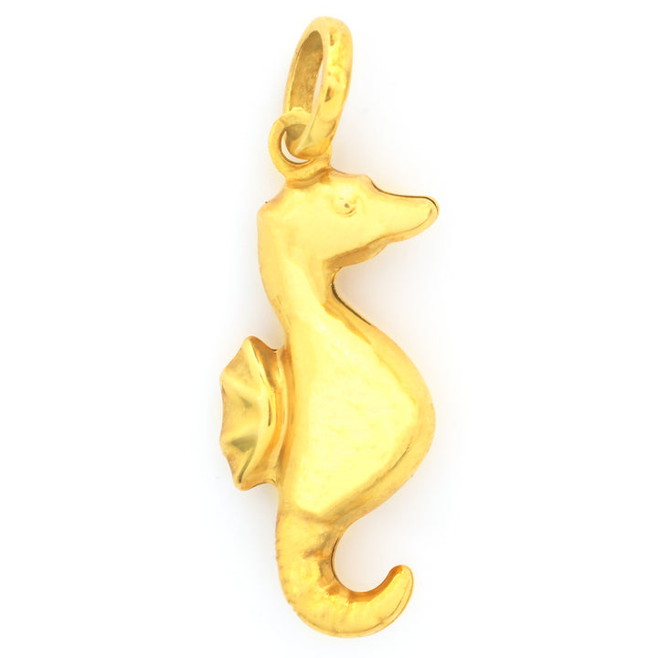 A polished yellow gold seahorse pendant charm with a textured finish and a secure top loop, shown against a plain white background.
