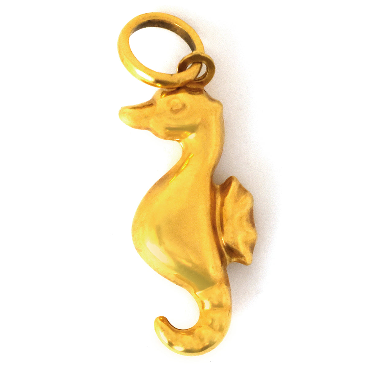 Gold seahorse pendant on a white background