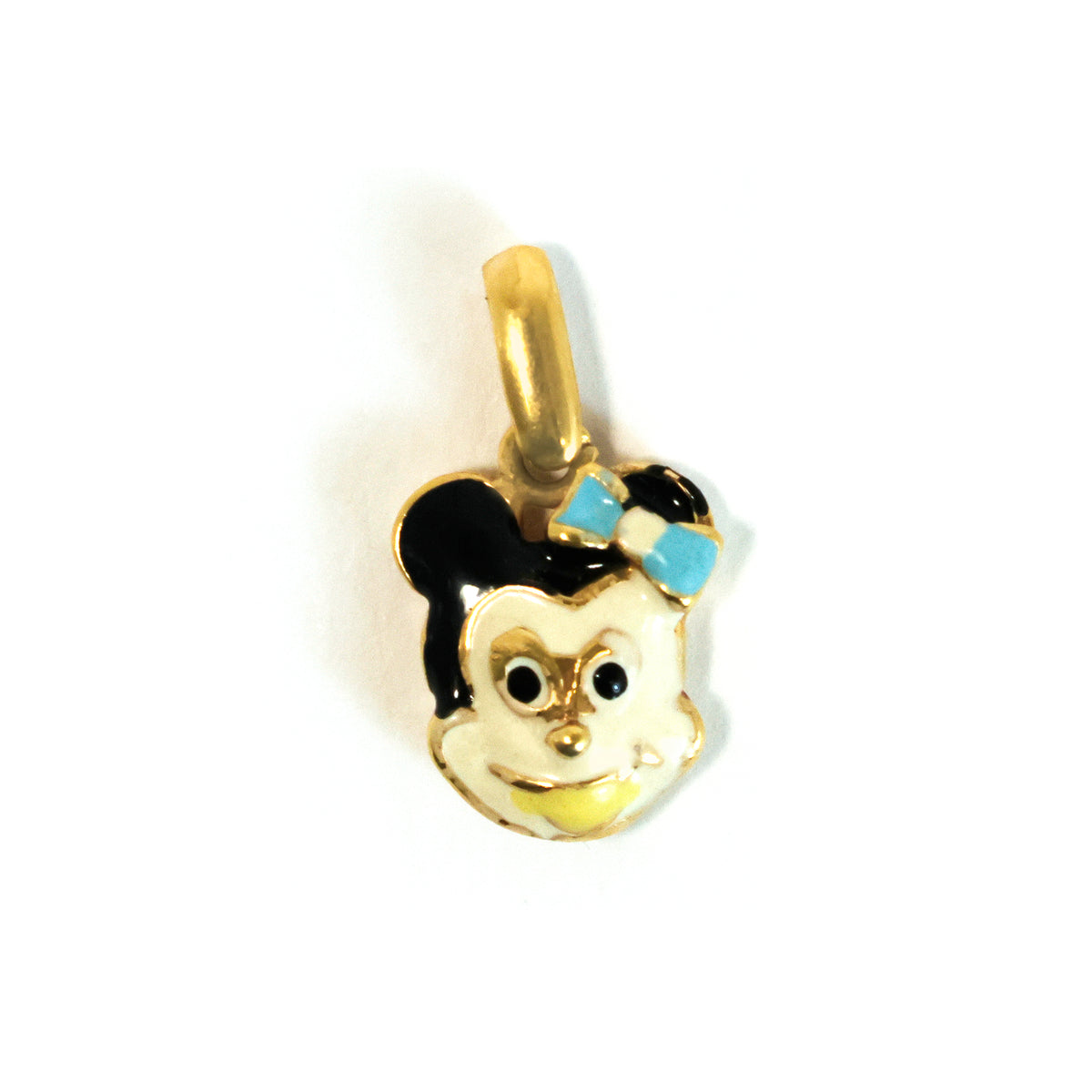 Gold pendant shaped like a cartoon character with black hair and a blue bow on a white background