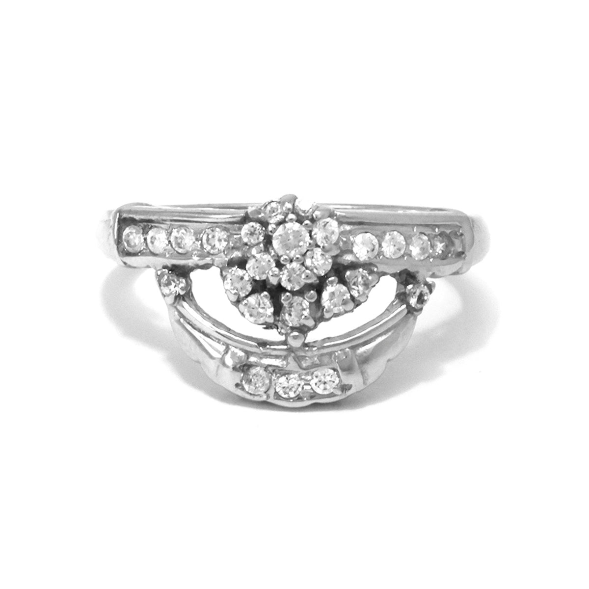 Silver ring with embedded diamonds on a white background
