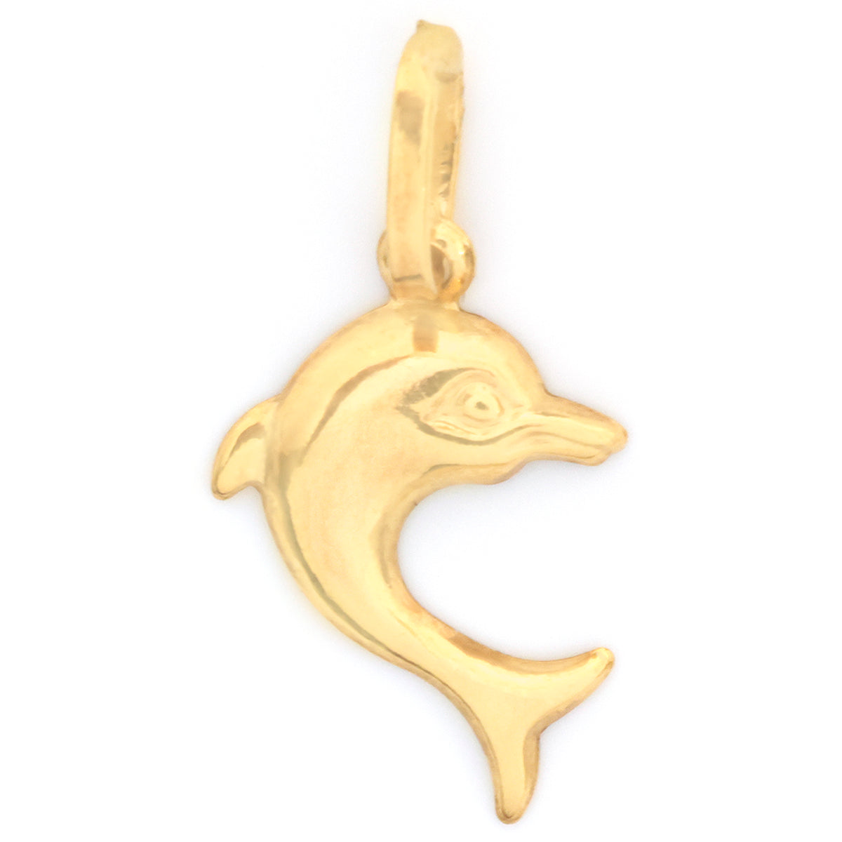 A polished yellow gold dolphin pendant charm with a detailed eye and curved body, shown on a plain white background.