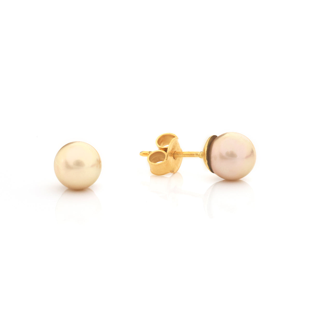 A pair of gold stud earrings with round pearl-like beads, one shown from the front and the other from the side displaying the post and butterfly backing, on a white background.