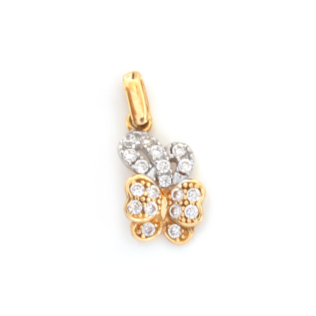 A butterfly-shaped pendant charm in yellow gold and white gold, adorned with small clear pavé gemstones, shown on a plain white background.