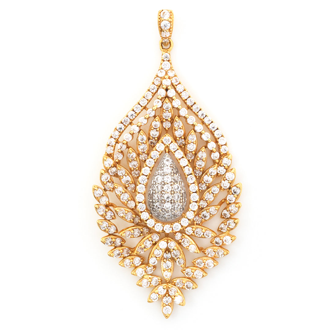 A teardrop-shaped gold pendant adorned with numerous small clear stones and a larger central teardrop cluster of stones, shown on a plain white background.