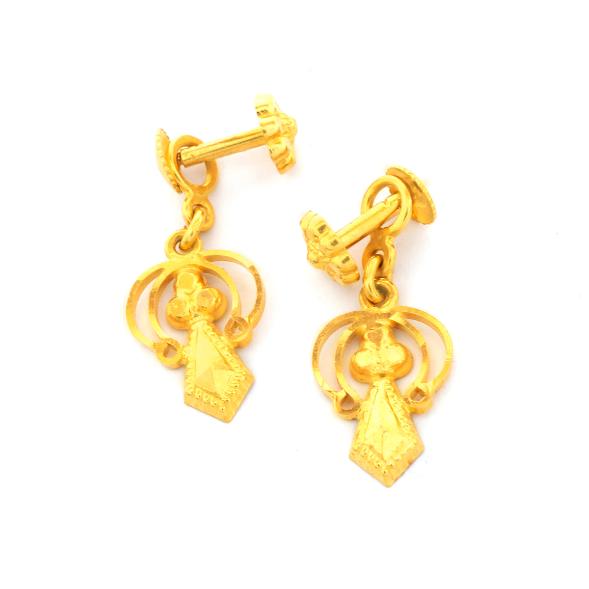 Pair of gold earrings on a white background