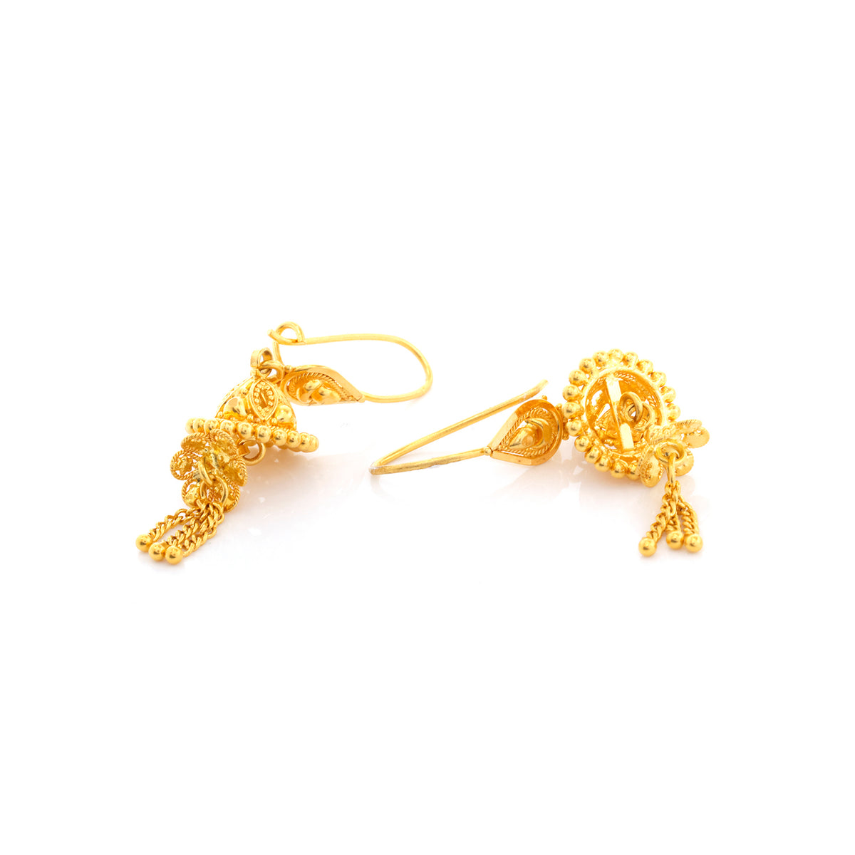Gold earrings on a white background