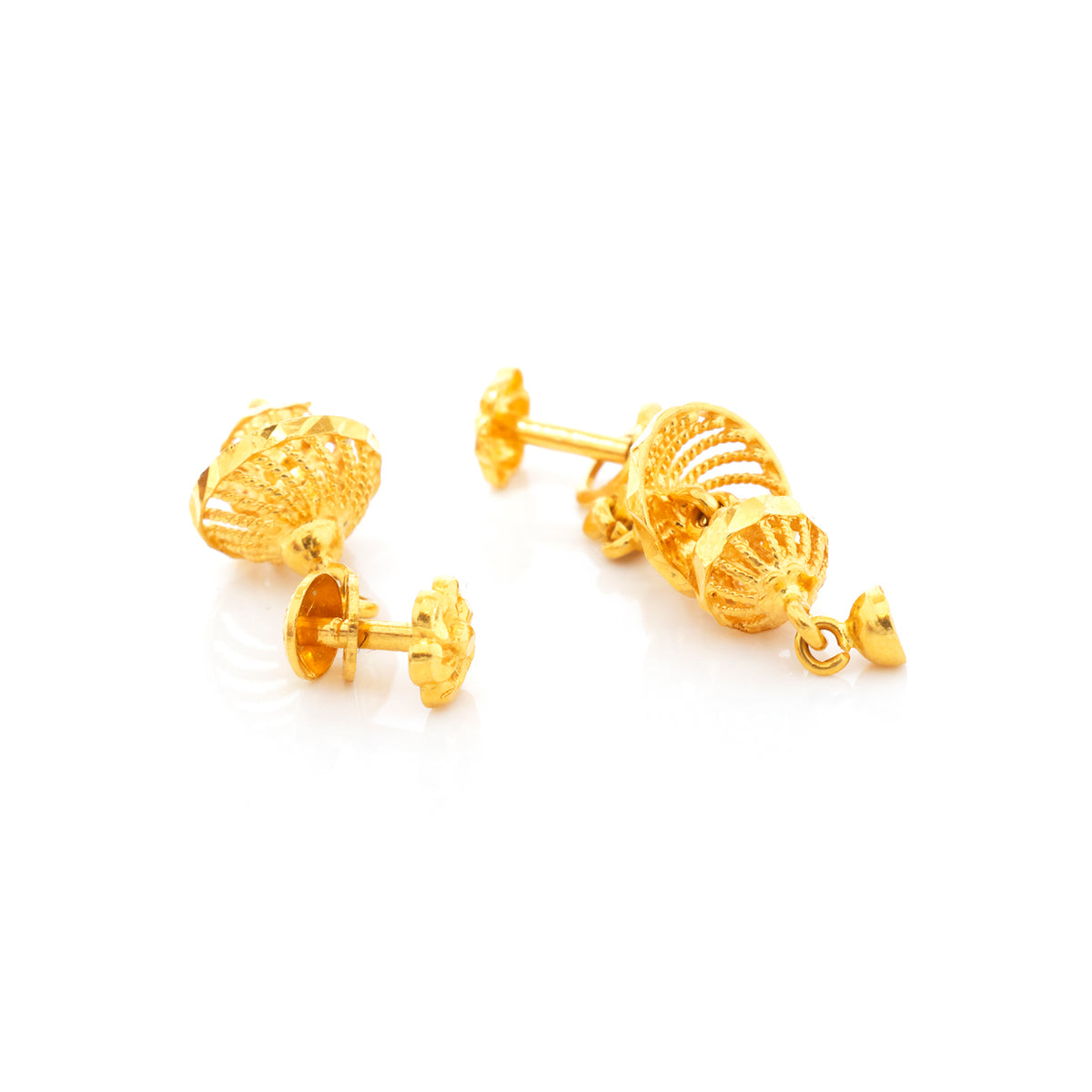 Pair of gold earrings on a white background
