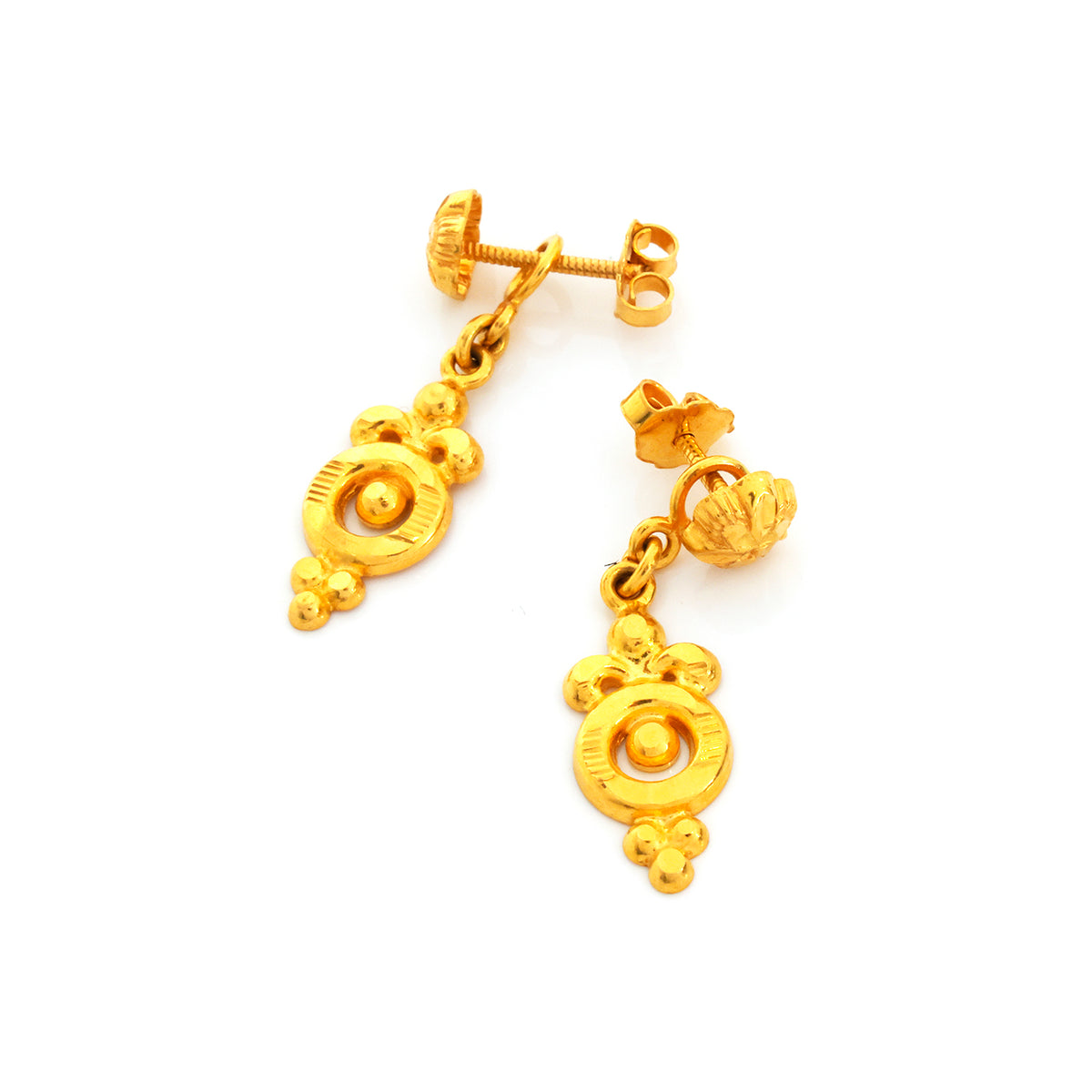 Pair of gold earrings on a white background
