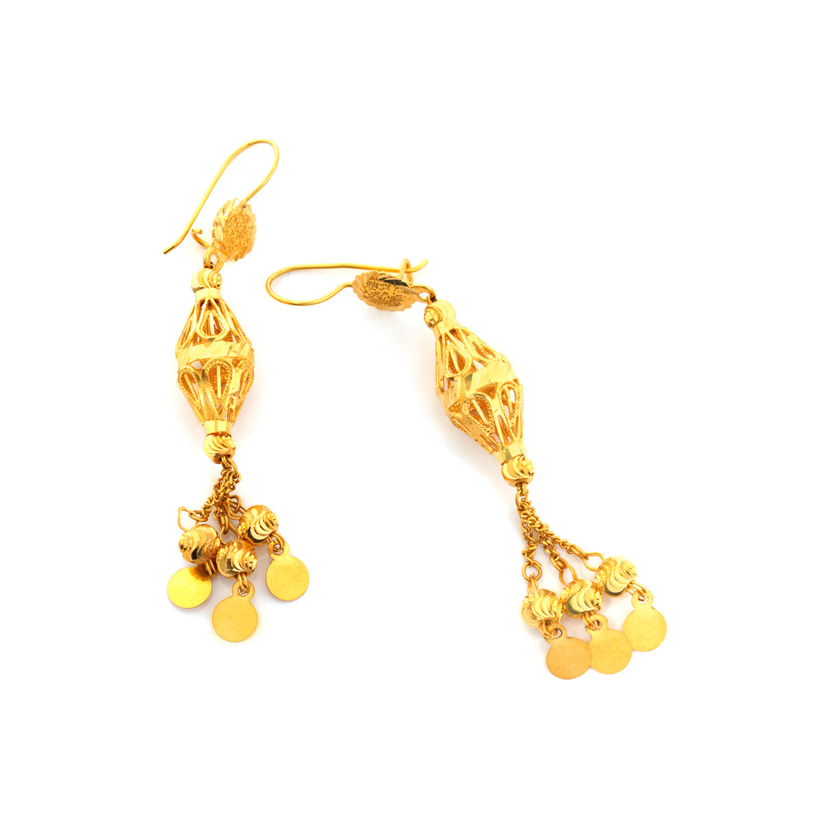 Gold earrings with intricate designs on a white background