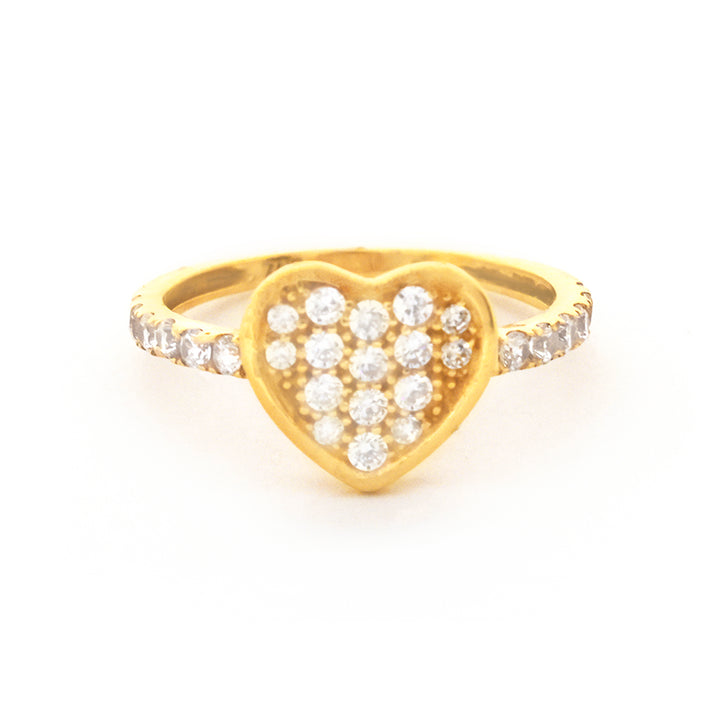 Gold heart-shaped ring with embedded diamonds on a white background