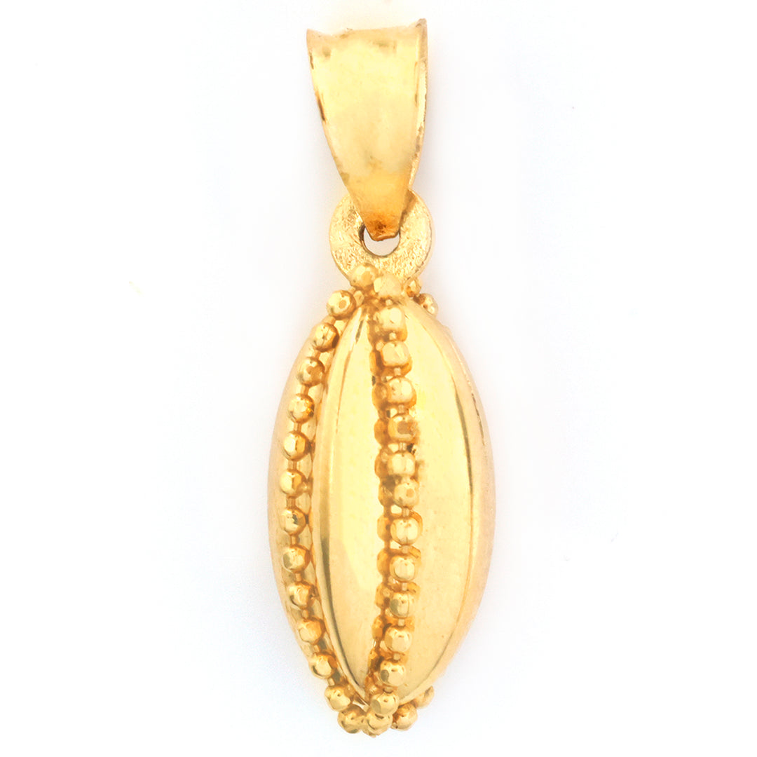 A gold pendant shaped like a cowrie shell, featuring a polished center line and beaded borders, shown on a plain white background.