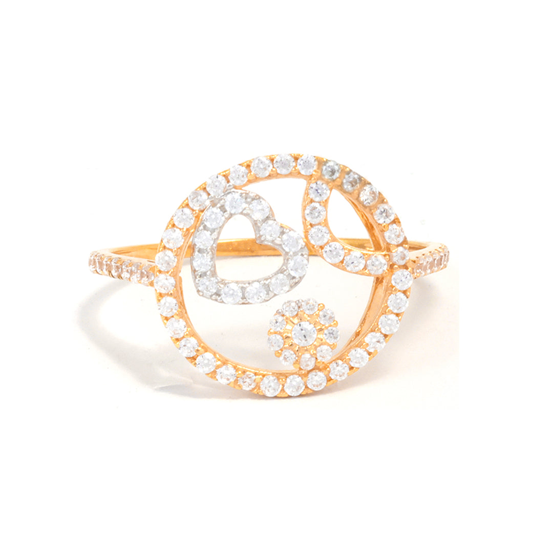 Gold ring with clear gemstones on a white background